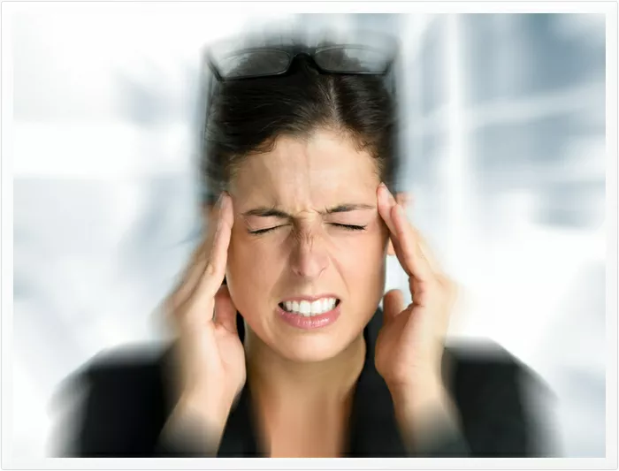 Counselling & psychotherapy for Stress in Wolverhampton Woman with stress hiolding her head