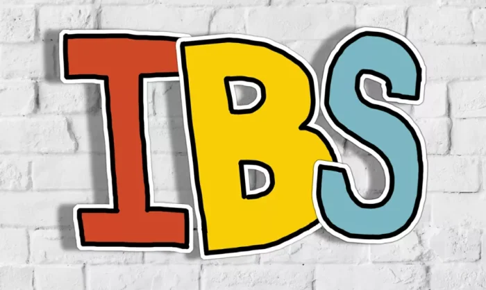 IBS letters on a white brick wall
