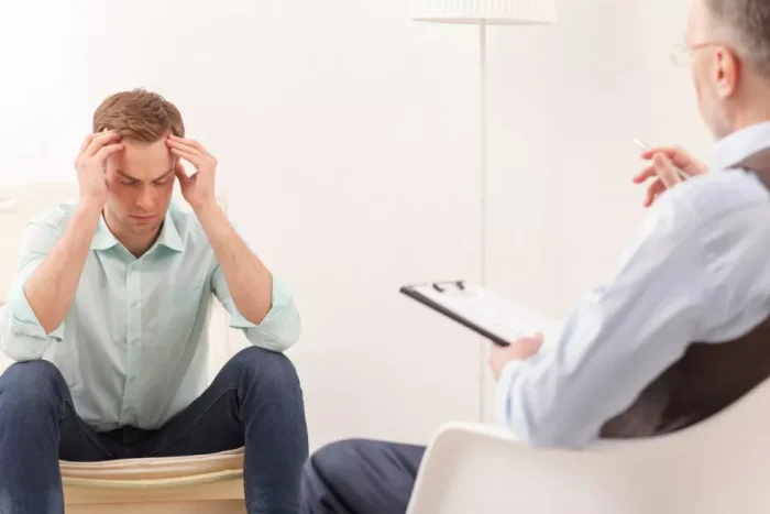 Male client in counselling session