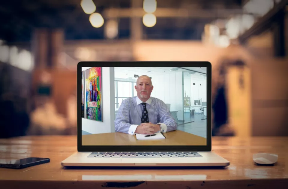 Online Therapy Worldwide Paul on a laptop screen
