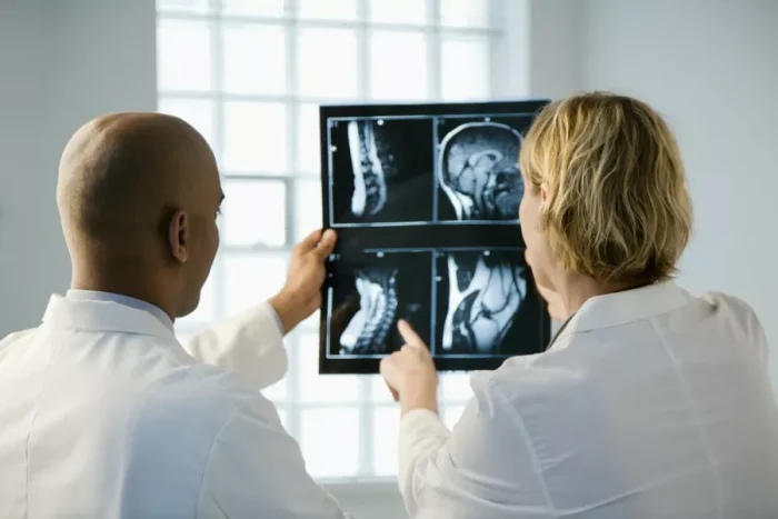 The medical model of addiction explains addictive behaviour as a brain disease doctors-examining-x-ray-scan