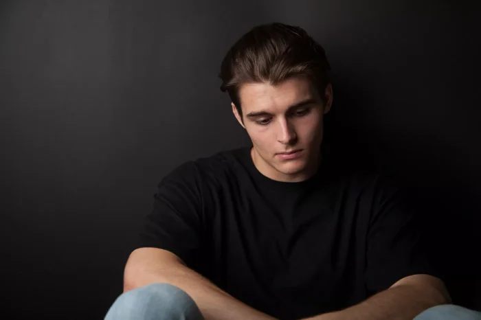 Young man with ED feeling depressed