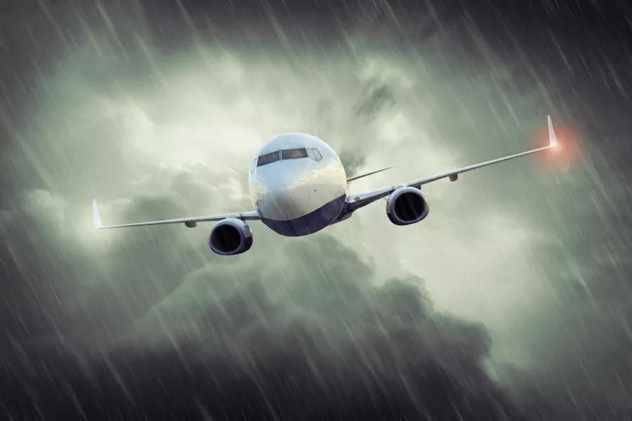 Plane flying through a heavy storm