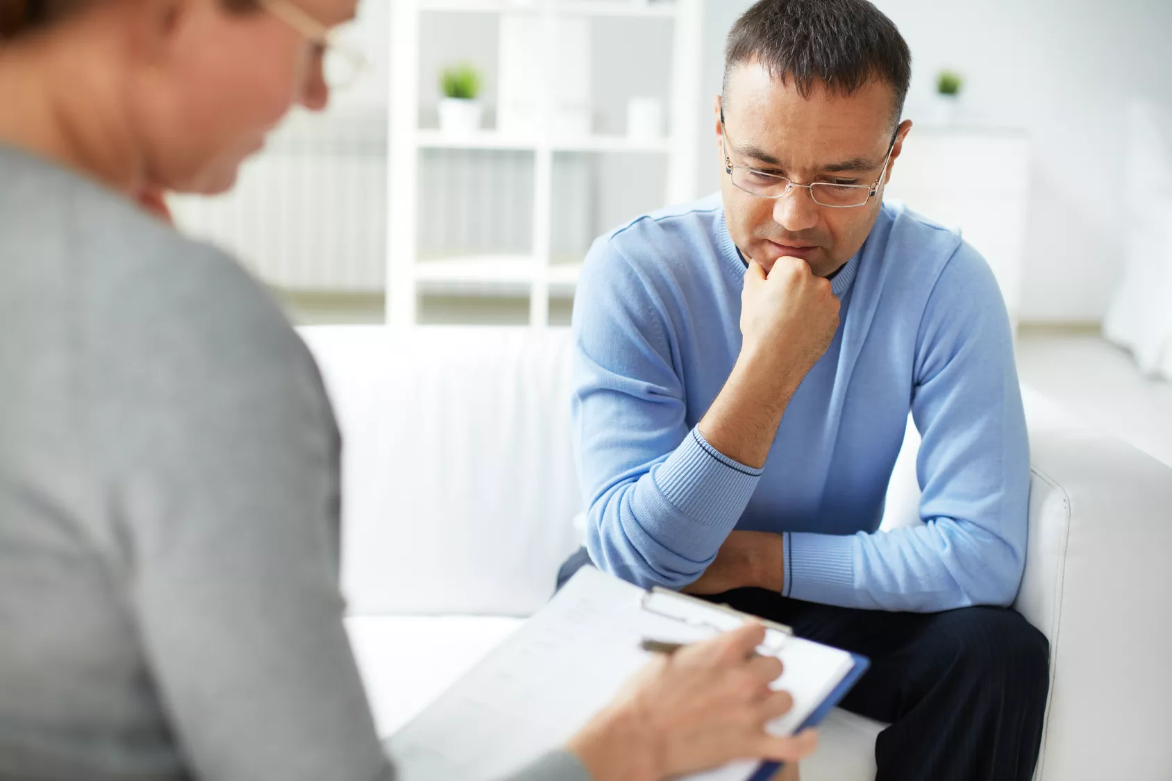female therapist and male client counselling session